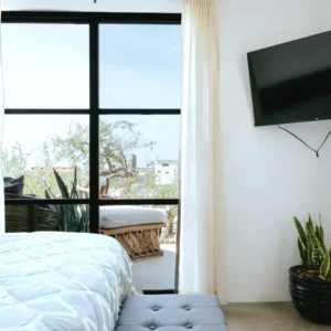 Casitas Pacifico bed window and mounted wall flat tv